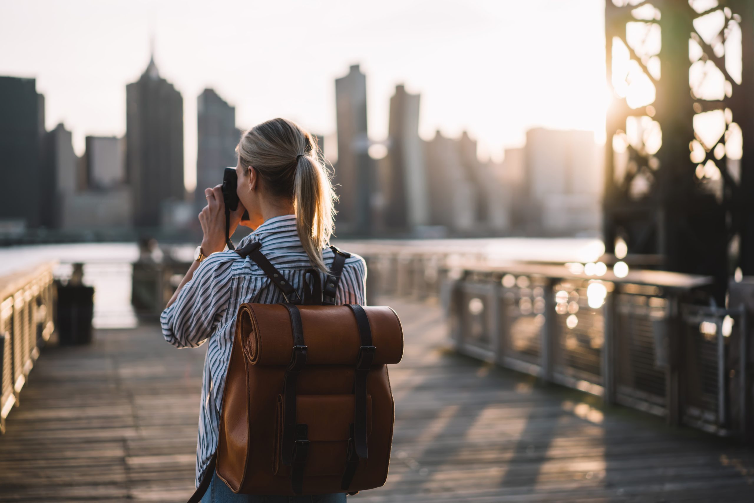 Back,View,Of,Skilled,Amateur,Photographer,Taking,Pictures,Of,American